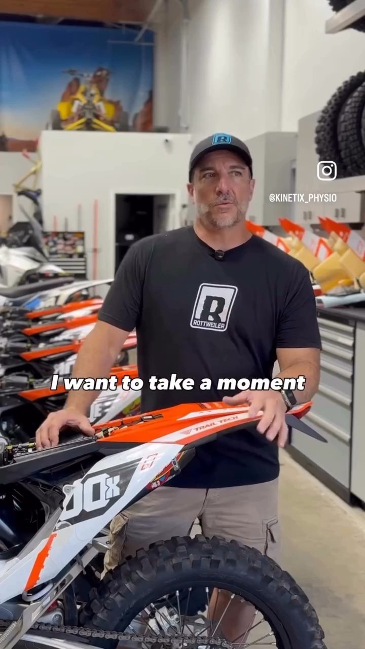 Chris P., owner of Rottweiler Performance, recording a video testimonial for Kinetix Physio